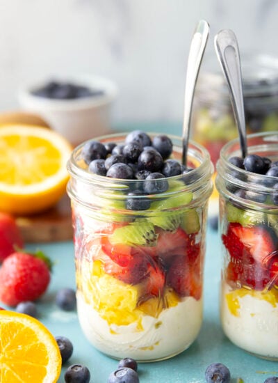 Take your fruit salad along to those summer picnics the easy way! Layer it up rainbow-style in a jar with a creamy citrus yogurt dressing. This layered fruit salad will quickly become a summer favorite.