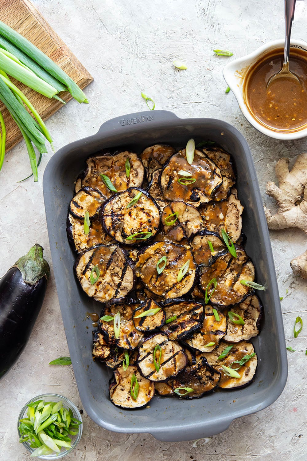 Grilled until crispy and drizzled in a flavorful miso ginger sauce, this miso grilled eggplant is the perfect way to use an abundance of eggplant and goes well with any Asian-inspired meal.