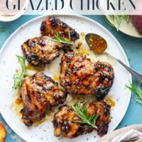 A sweet, jammy honey peach glaze coats every inch of juicy grilled chicken thighs in this peach glazed chicken that's incredible with fresh summer peaches.