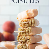 Juicy summer peaches and a crunchy brown sugar streusel are the perfect match in these multi-layered peach popsicles!