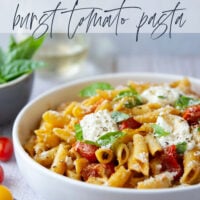Garden-fresh burst tomato pasta features juicy cherry tomatoes cooked in flavorful white wine with lots of fresh garlic and basil.