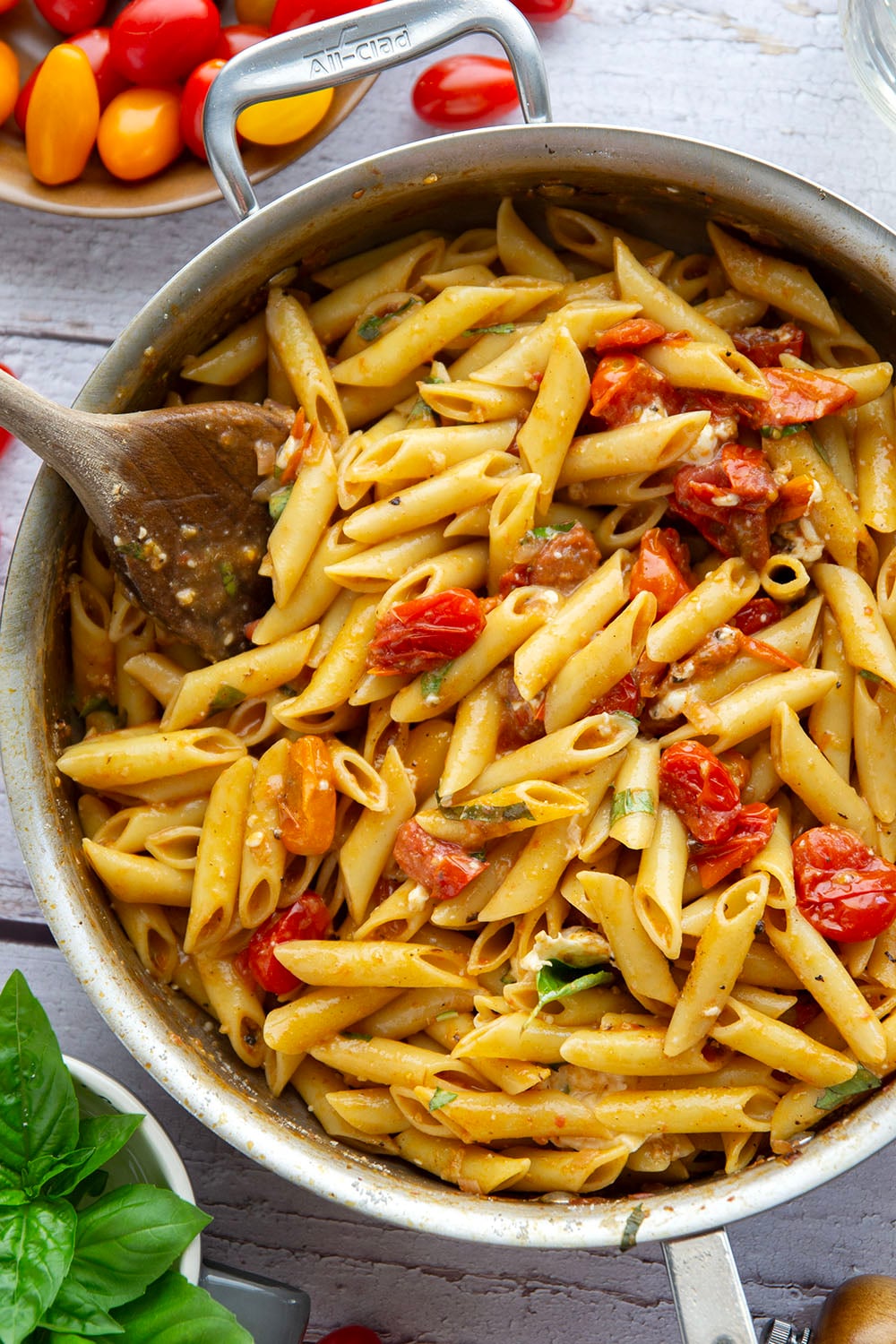 Garden-fresh burst tomato pasta features juicy cherry tomatoes cooked in flavorful white wine with lots of fresh garlic and basil.