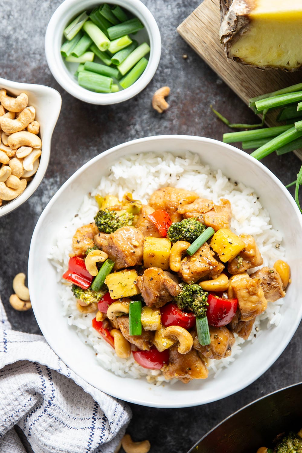 Crunchy cashews and sweet pineapple deliver an incredible contrast of flavors and textures in this sweet and saucy pineapple chicken stir fry.