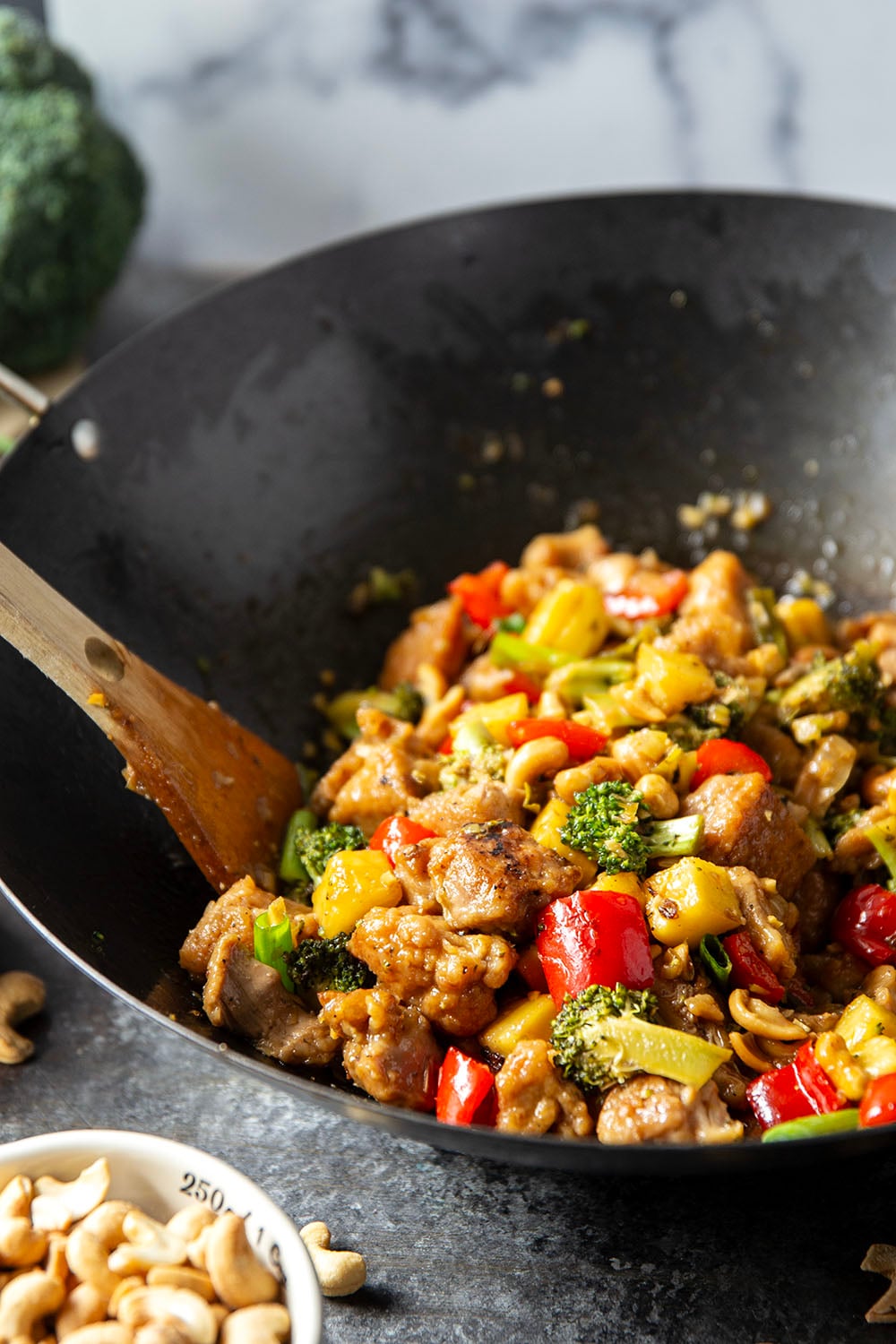 Crunchy cashews and sweet pineapple deliver an incredible contrast of flavors and textures in this sweet and saucy pineapple chicken stir fry.
