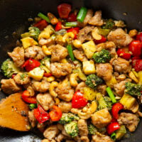 Crunchy cashews and sweet pineapple deliver an incredible contrast of flavors and textures in this sweet and saucy pineapple chicken stir fry.
