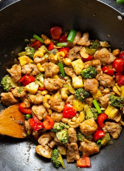 Crunchy cashews and sweet pineapple deliver an incredible contrast of flavors and textures in this sweet and saucy pineapple chicken stir fry.
