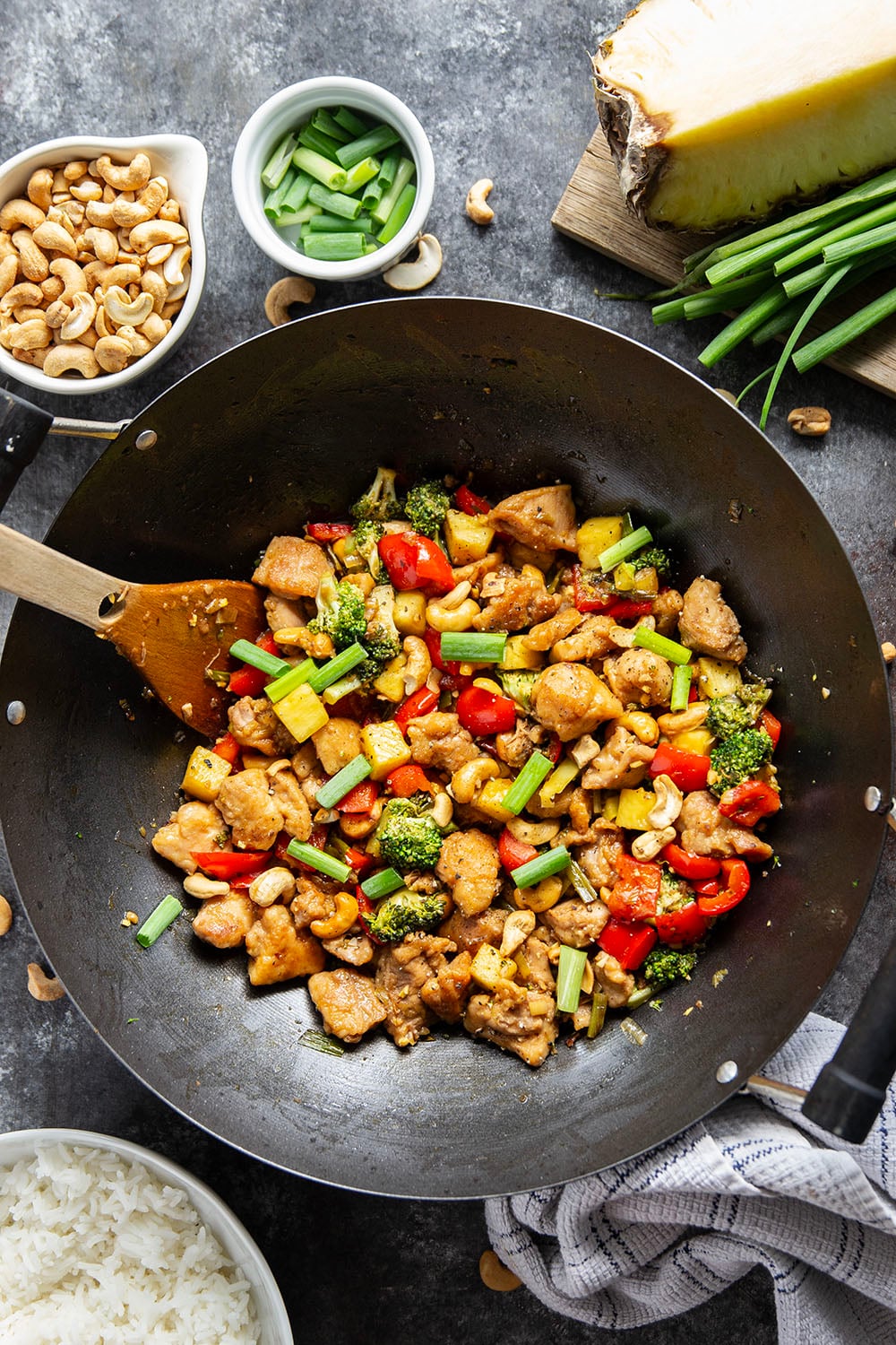 Crunchy cashews and sweet pineapple deliver an incredible contrast of flavors and textures in this sweet and saucy pineapple chicken stir fry.
