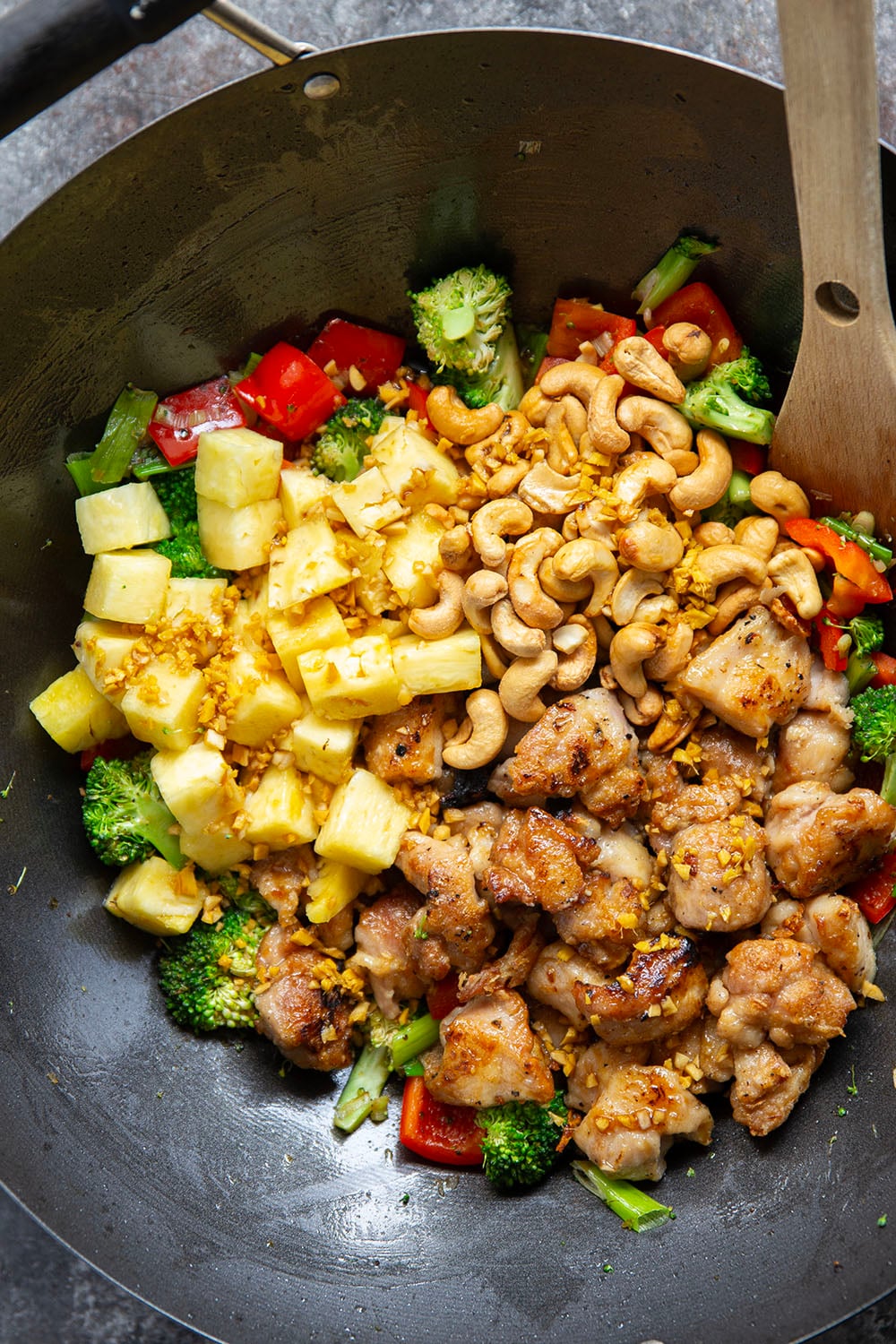 Crunchy cashews and sweet pineapple deliver an incredible contrast of flavors and textures in this sweet and saucy pineapple chicken stir fry.