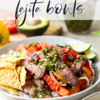 Juicy grilled sirloin steak, sweet peppers, and an herby fresh chimichurri sauce make for the ultimate summer steak fajita bowls.