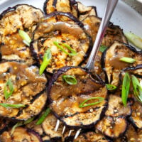Grilled until crispy and drizzled in a flavorful miso ginger sauce, this miso grilled eggplant is the perfect way to use an abundance of eggplant and goes well with any Asian-inspired meal.