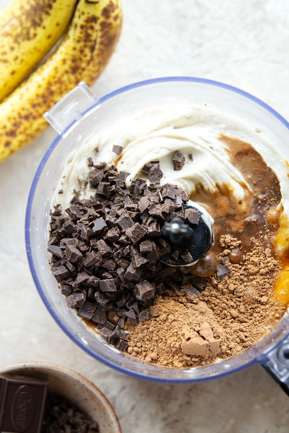 Rich brewed coffee and crunchy chocolate pieces star in this creamy coffee banana ice cream that's entirely banana-based and doesn't even require an ice cream maker!