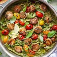 These pesto zucchini noodles come together in minutes with only a handful of summer ingredients and feature lots of flavorful pesto and tender seared scallops on top.