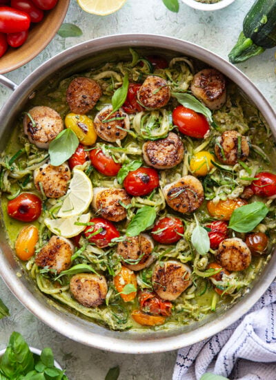 These pesto zucchini noodles come together in minutes with only a handful of summer ingredients and feature lots of flavorful pesto and tender seared scallops on top.