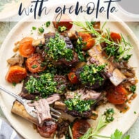 Fall-apart tender beef short ribs with gremolata feature red wine-braised short ribs cooked for hours until tender and topped with a fresh, herby gremolata topping.