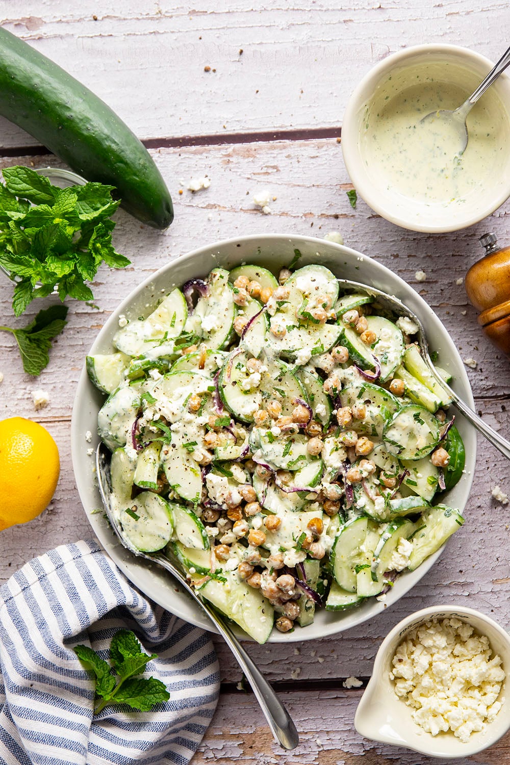Crispy roasted chickpeas, crunchy cucumber slices, and a cool, creamy mint dressing work incredibly well together in this quick and easy chickpea cucumber salad.