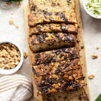This dark chocolate zucchini bread is so moist and exploding with gooey dark chocolate chunks, you won't believe it's on the healthier side!