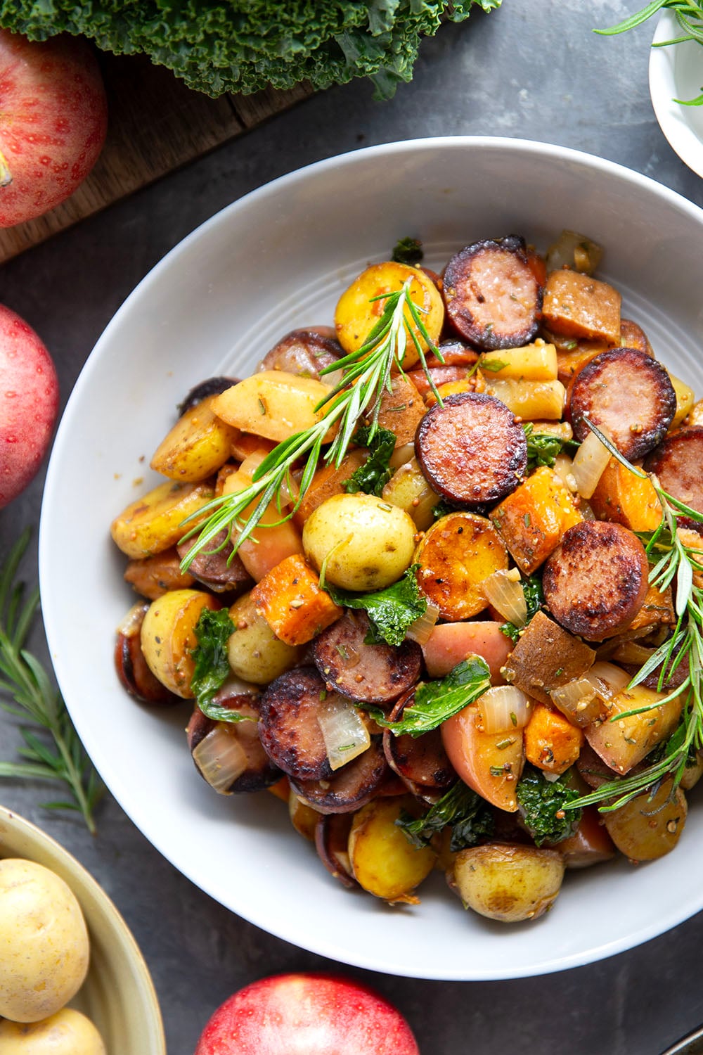Packed with juicy sausage slices and tons of tender fall vegetables, this sausage vegetable skillet cooks up all in one skillet and is packed with flavor!