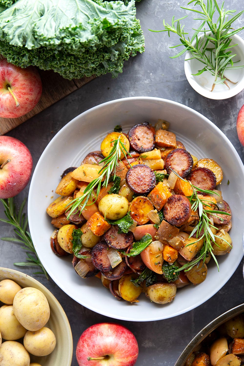 Packed with juicy sausage slices and tons of tender fall vegetables, this sausage vegetable skillet cooks up all in one skillet and is packed with flavor!