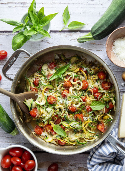 Made in one pan in only 10 minutes and loaded with freshly grated Parmesan and lots of fresh garlic, these garlic Parmesan zucchini noodles are a side dish that goes well with any summer meal.