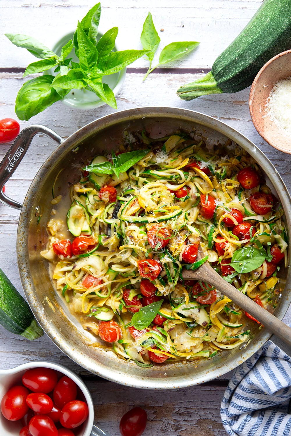 Made in one pan in only 10 minutes and loaded with freshly grated Parmesan and lots of fresh garlic, these garlic Parmesan zucchini noodles are a side dish that goes well with any summer meal.