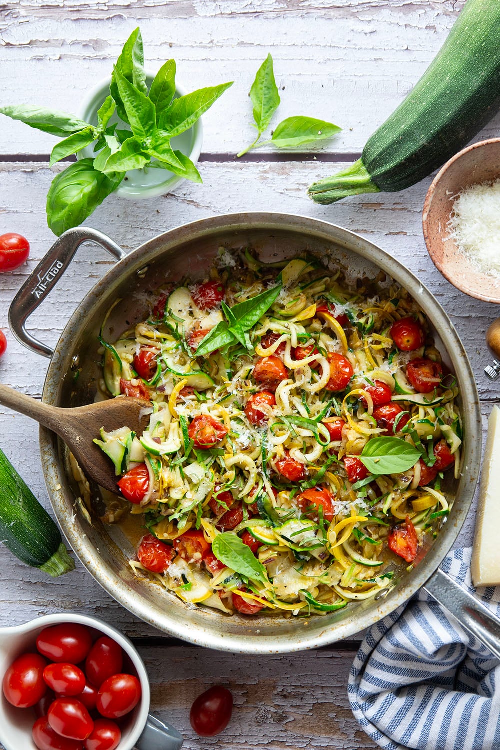 Made in one pan in only 10 minutes and loaded with freshly grated Parmesan and lots of fresh garlic, these garlic Parmesan zucchini noodles are a side dish that goes well with any summer meal.