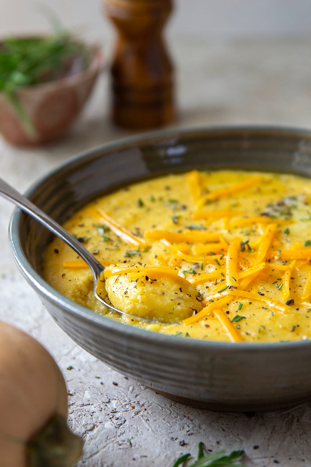 Sharp melted cheddar cheese and creamy homemade butternut squash puree make an incredible fall pairing in this rich and creamy butternut squash polenta.