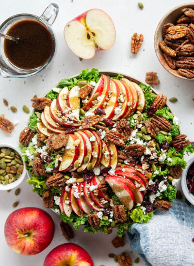 Piled with crisp apples, homemade candied pecans, and a tangy maple balsamic dressing, this candied pecan salad is an easy fall salad that's always a crowd-pleaser.