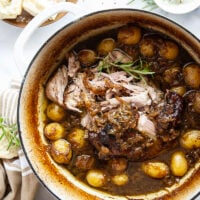 Braised for hours in a caramelized onion sauce with lots of hearty potatoes, this braised pork shoulder cooks up fall-apart tender and makes a great meat entree for any occasion.
