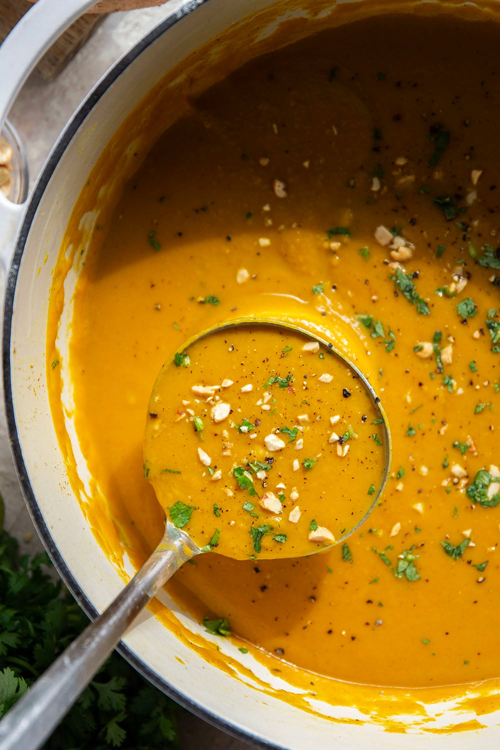Hearty sweet potatoes and flavorful spices combine in this curried sweet potato soup that has a velvety-smooth texture and pairs very well with a grilled cheese or crusty bread for dipping.