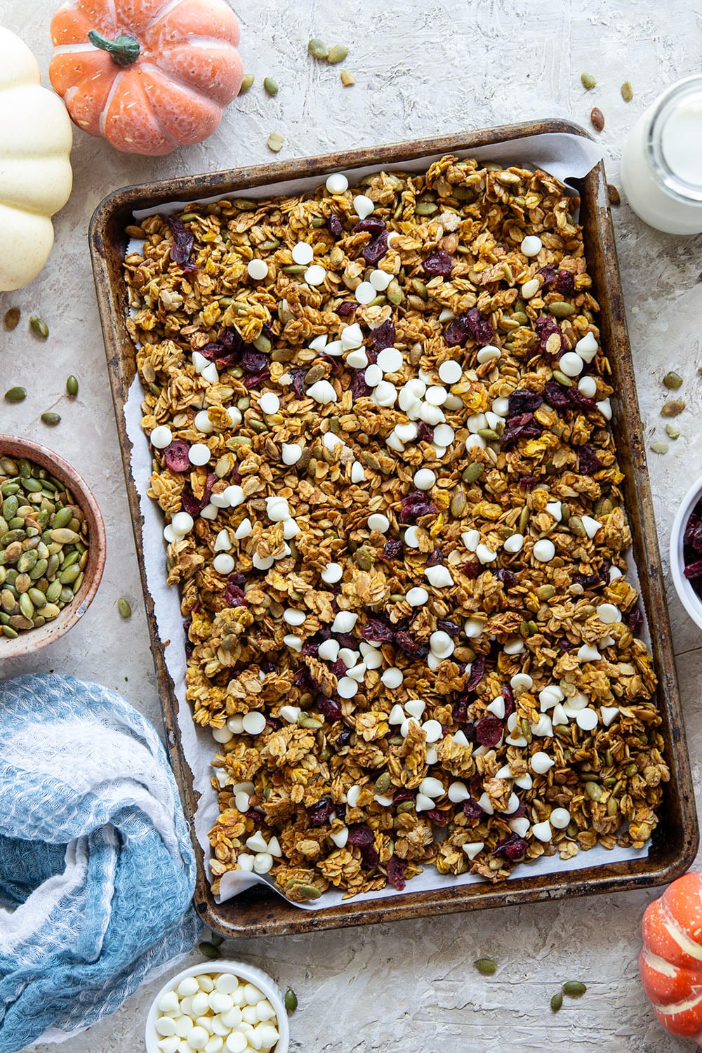 This crisp pumpkin granola has a delightful fall twist of warming spices, real pumpkin puree, white chocolate, and dried cranberries.