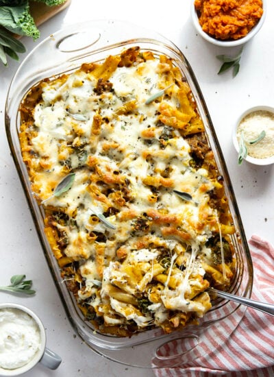 Baked in a creamy pumpkin white sauce with two kinds of cheese and tender sausage bits, this pumpkin baked ziti is a fun fall twist on the classic comfort dish.