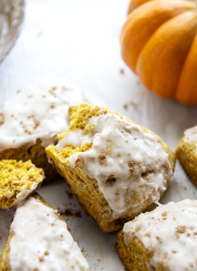 These pumpkin spice scones are extra moist and flaky, loaded with pumpkin and warm spices, and the perfect pairing with a cup of coffee.